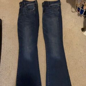 2 pairs of darker blue, bootcut jeans